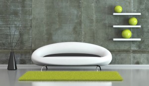 Wohndesign - modernes Sofa vor Betonwand